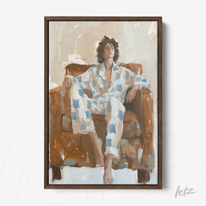 framed artwork of a man lounging on a couch wearing blue and white pajamas