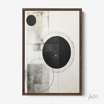 abstract framed wall art in black and white featuring geometric shapes with dark wood frame