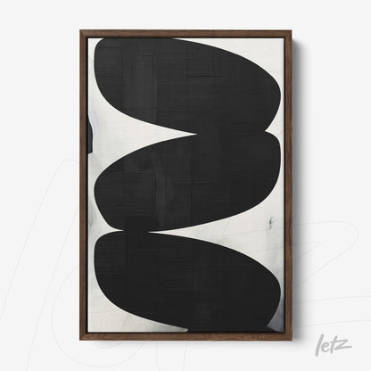 abstract wall art in black and white in dark wood frame