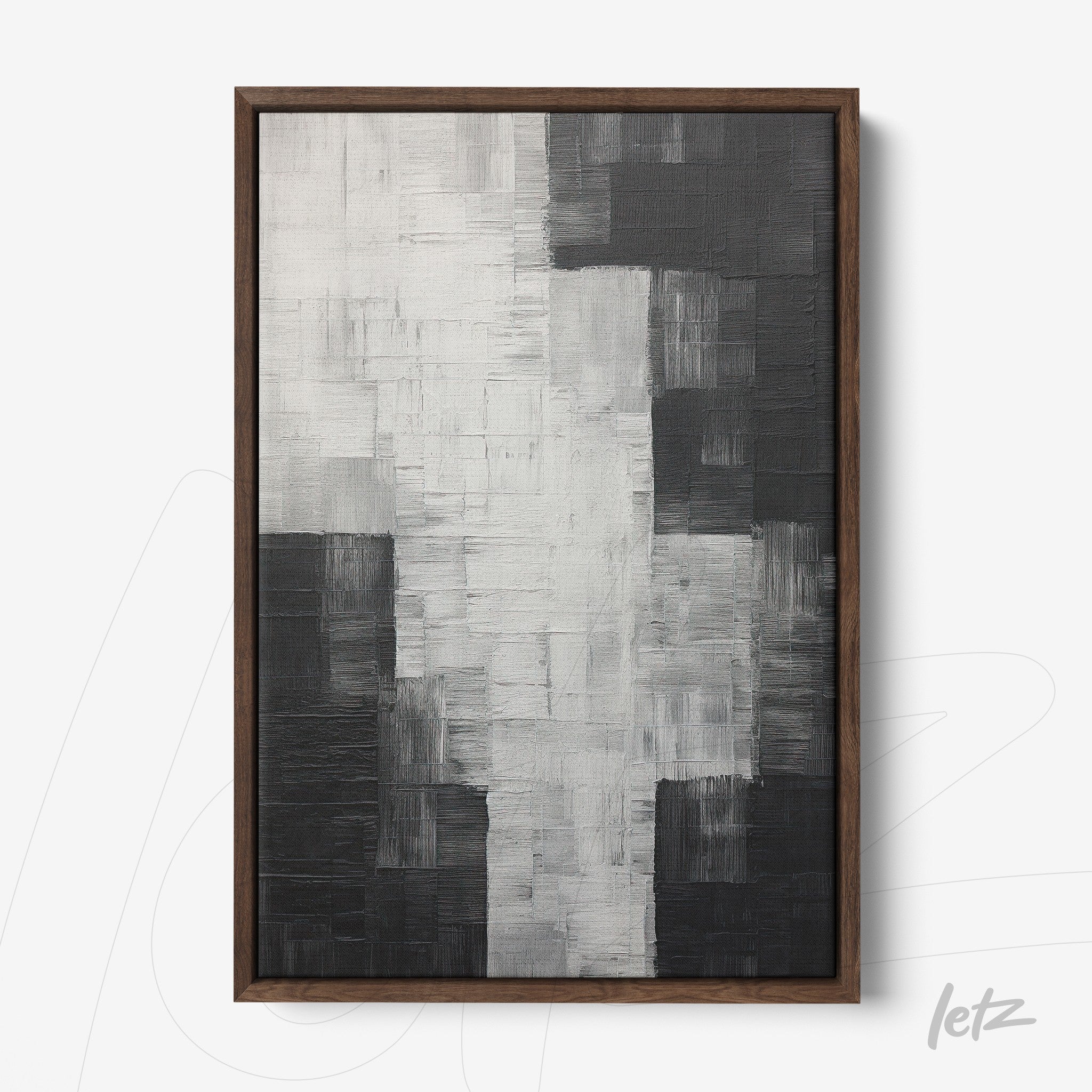 abstract wall art in shades of black and white with expressive texture in dark wood frame