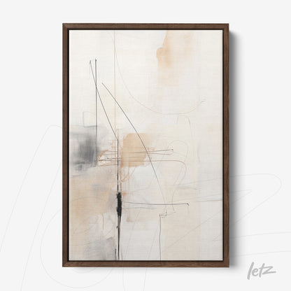 abstract framed wall art in neutral tones with black lines in dark wood frame