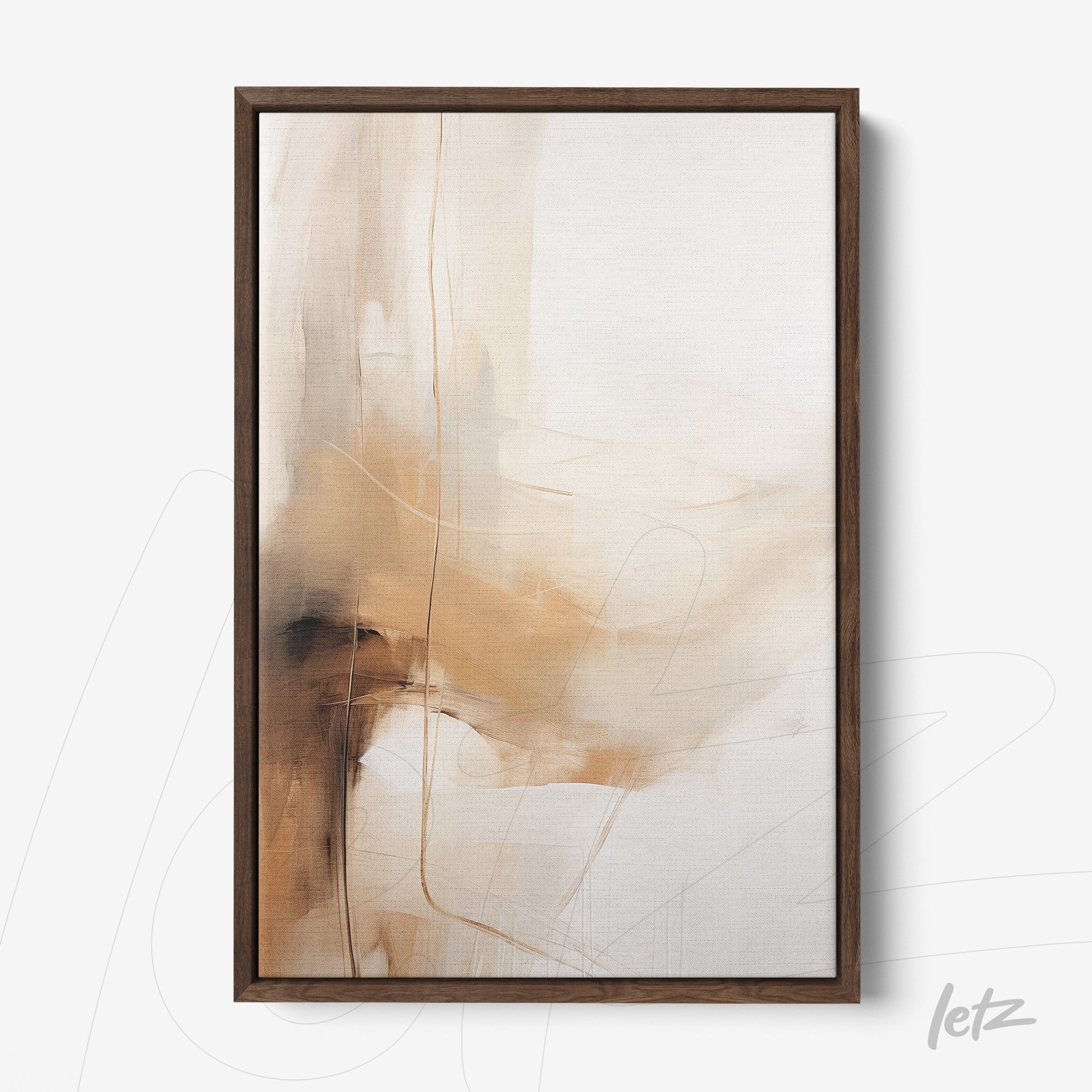 framed abstract art in shades of beige and brown with dark wood frame