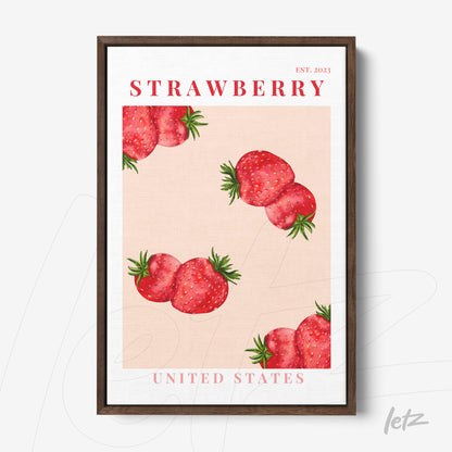framed art piece featuring red strawberries on a pink background with a dark wood frame