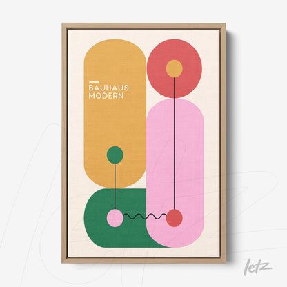 framed geometric art with vibrant colors and light wooden frame