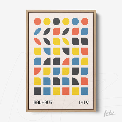 bauhaus-inspired geometric art with colorful shapes in a wooden frame on a light background