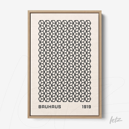 framed print featuring repetitive black geometric patterns with the text bauhaus 1919 at the bottom in light wood frame