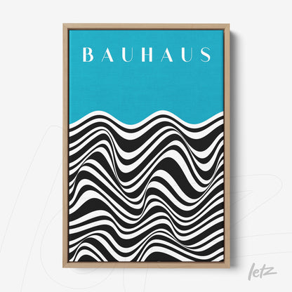 canvas print featuring black and white geometric art in Bauhaus style with a blue background and light wood frame