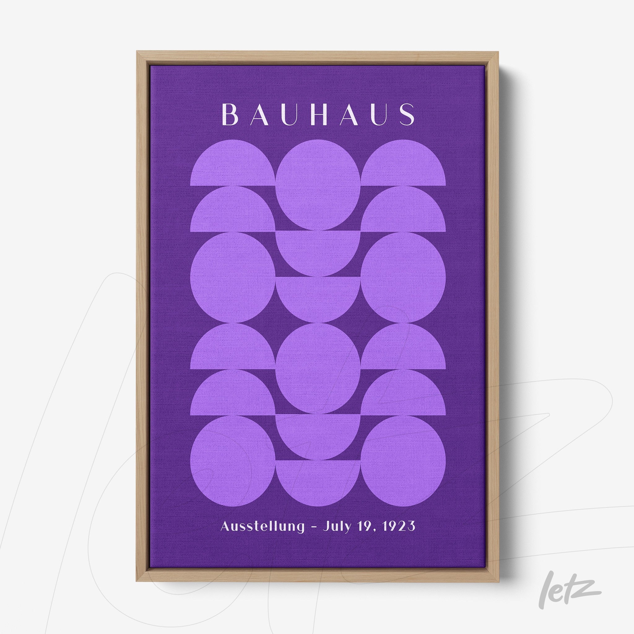 geometric art print in purple with semicircular shapes and light wood frame