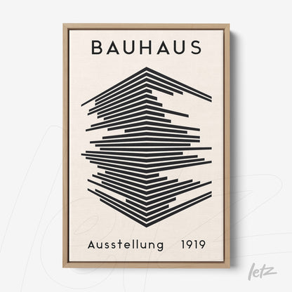 geometric art print of the 1919 bauhaus exhibition in a light wood frame