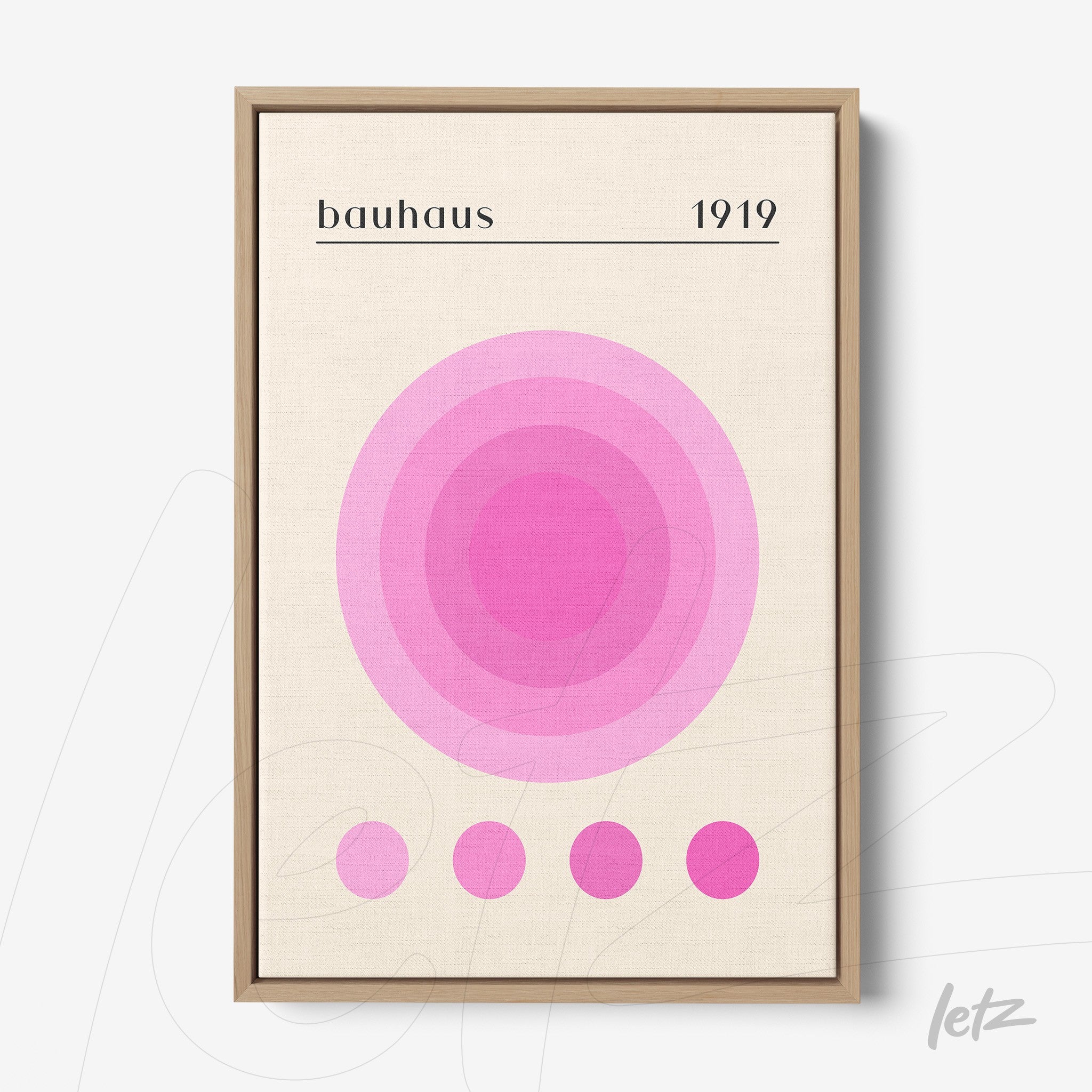 poster with geometric design of pink circles on beige background with light wood frame