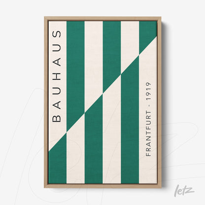 modern style framed art with green diagonal stripe and 'bauhaus' text in light wood frame