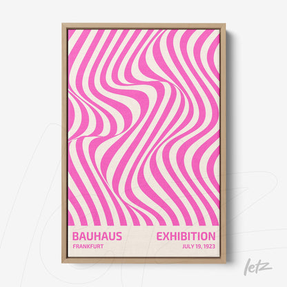 poster with vibrant pink wavy pattern in light wooden frame