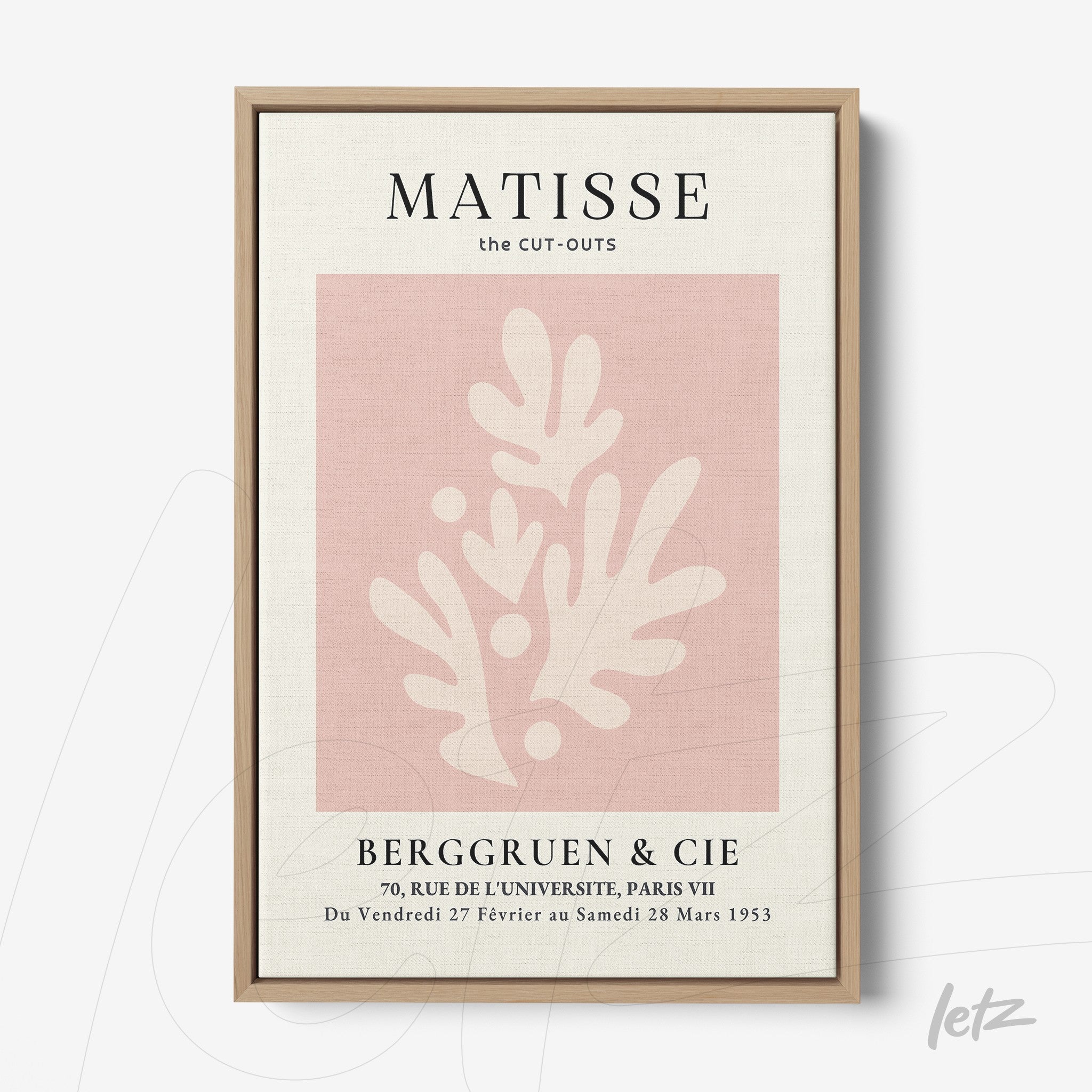 decorative framed art featuring a pink and cream cut-out illustration inspired by Matisse, with a light wood frame