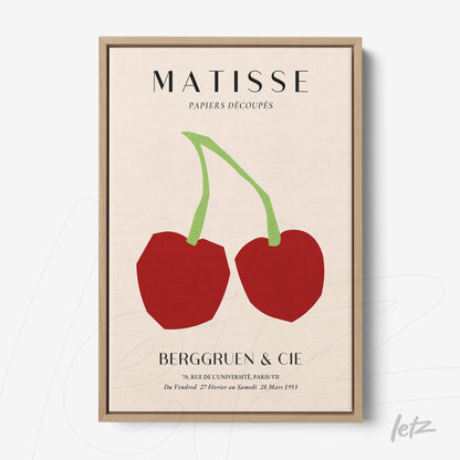 framed art by Matisse featuring stylized cherries on a neutral background with light frame