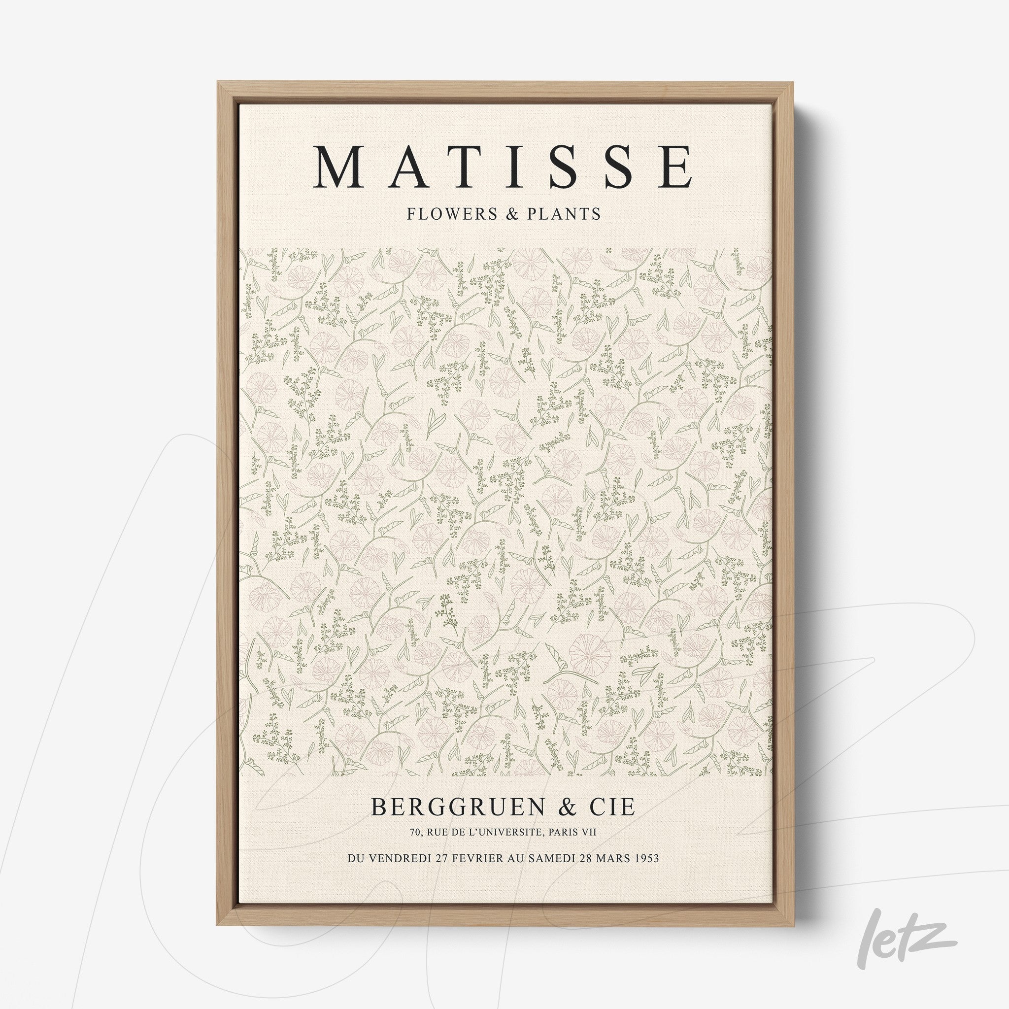 framed vintage style wall art featuring floral pattern in soft colors and light wood frame