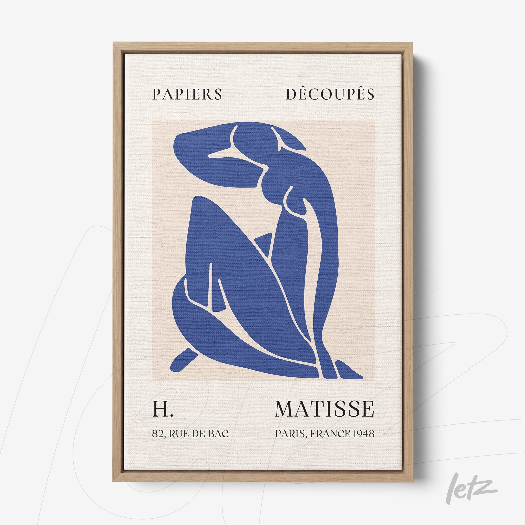 framed modern art piece featuring a stylized blue figure on a neutral background with a light wood frame