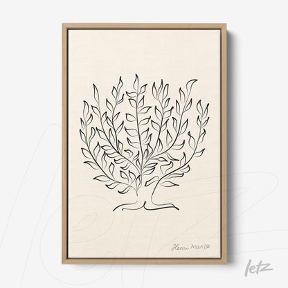 framed wall art featuring minimalist illustration of leafy plants in black outlines with light wood frame