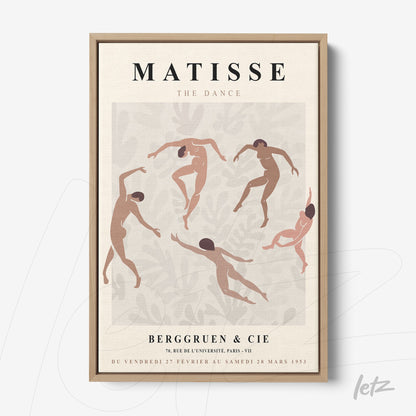 decorative art piece featuring abstract dancers in earthy tones framed in light wood