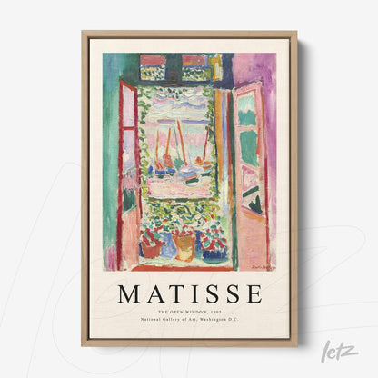 framed artwork by matisse featuring an open window with vibrant colors, showcasing potted flowers and a colorful view, in light wooden frame