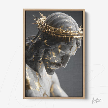 digital artwork of Christ with thorn crown, featuring golden details against a gray background, in a light wood frame