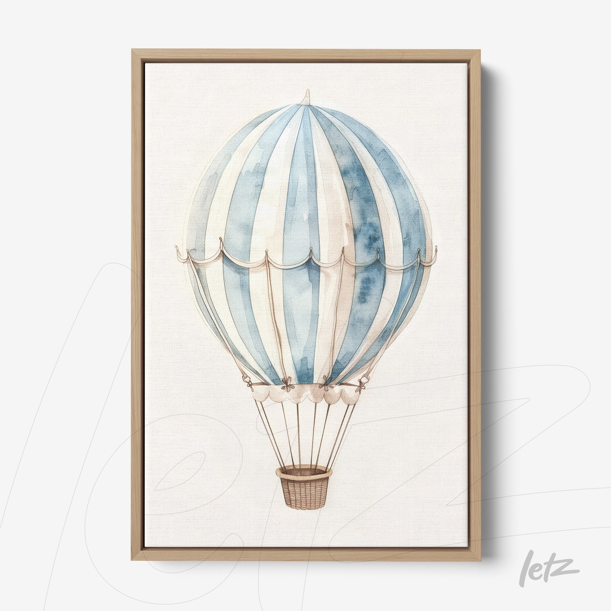 framed art of a hot air balloon in shades of blue and white with light wood frame