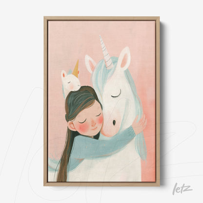 canvas art featuring a girl hugging a unicorn, soft pink background and light wood frame