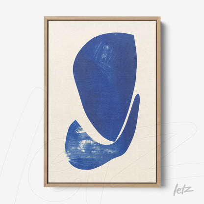 abstract art print in shades of blue on beige background with light wood frame