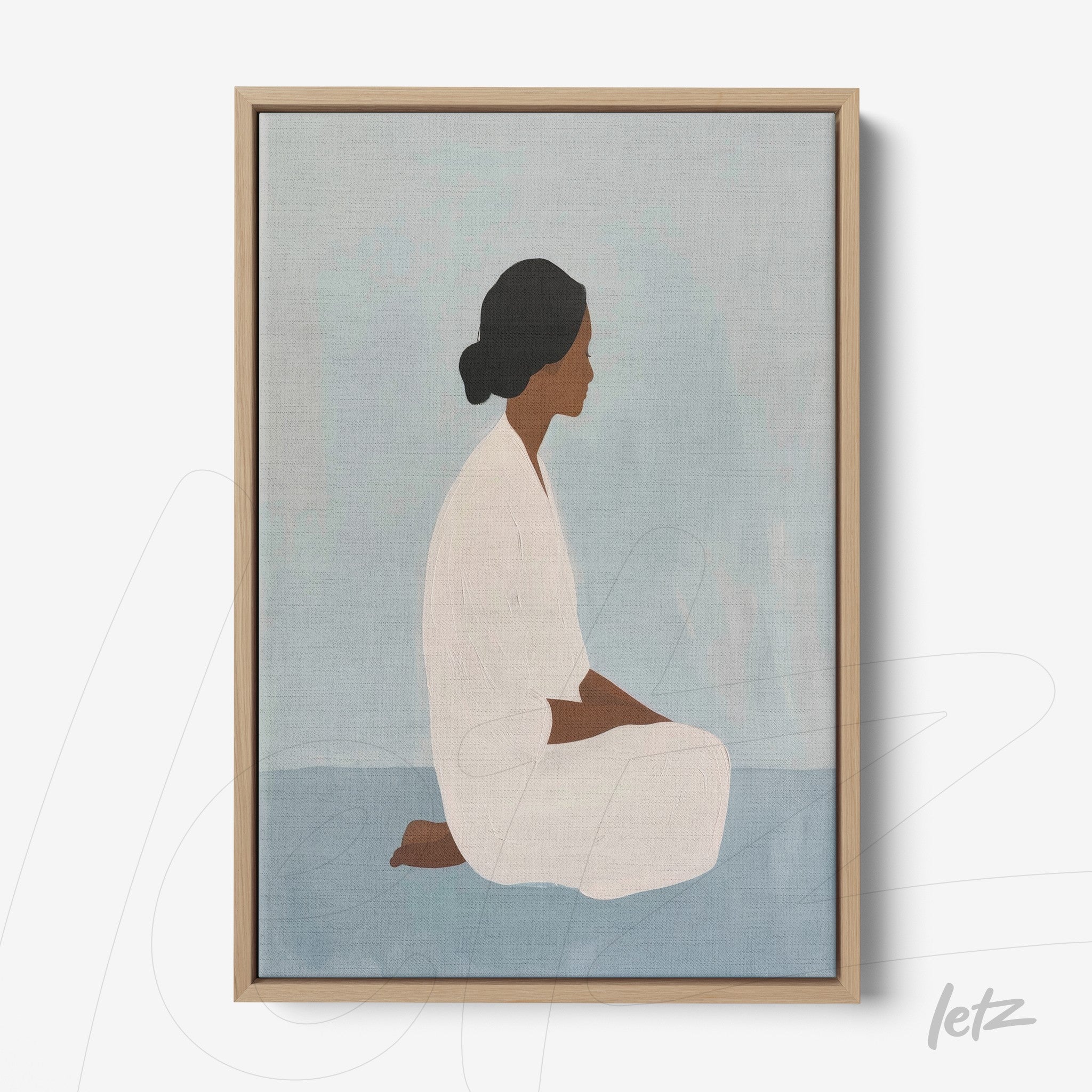 framed wall art featuring a minimalist depiction of a seated woman in soft tones with a light wood frame