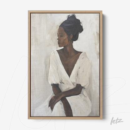 canvas print featuring a portrait of a Black woman in a white dress, framed in light wood