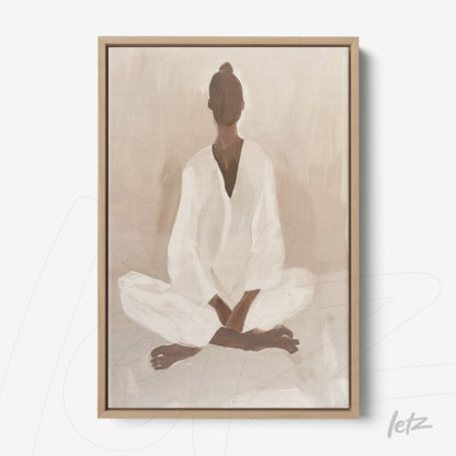 framed artwork of an abstract feminine figure in a meditative pose with light wood frame