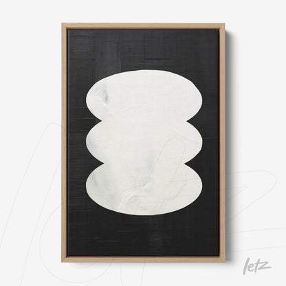 framed wall art with organic white shape on textured black background