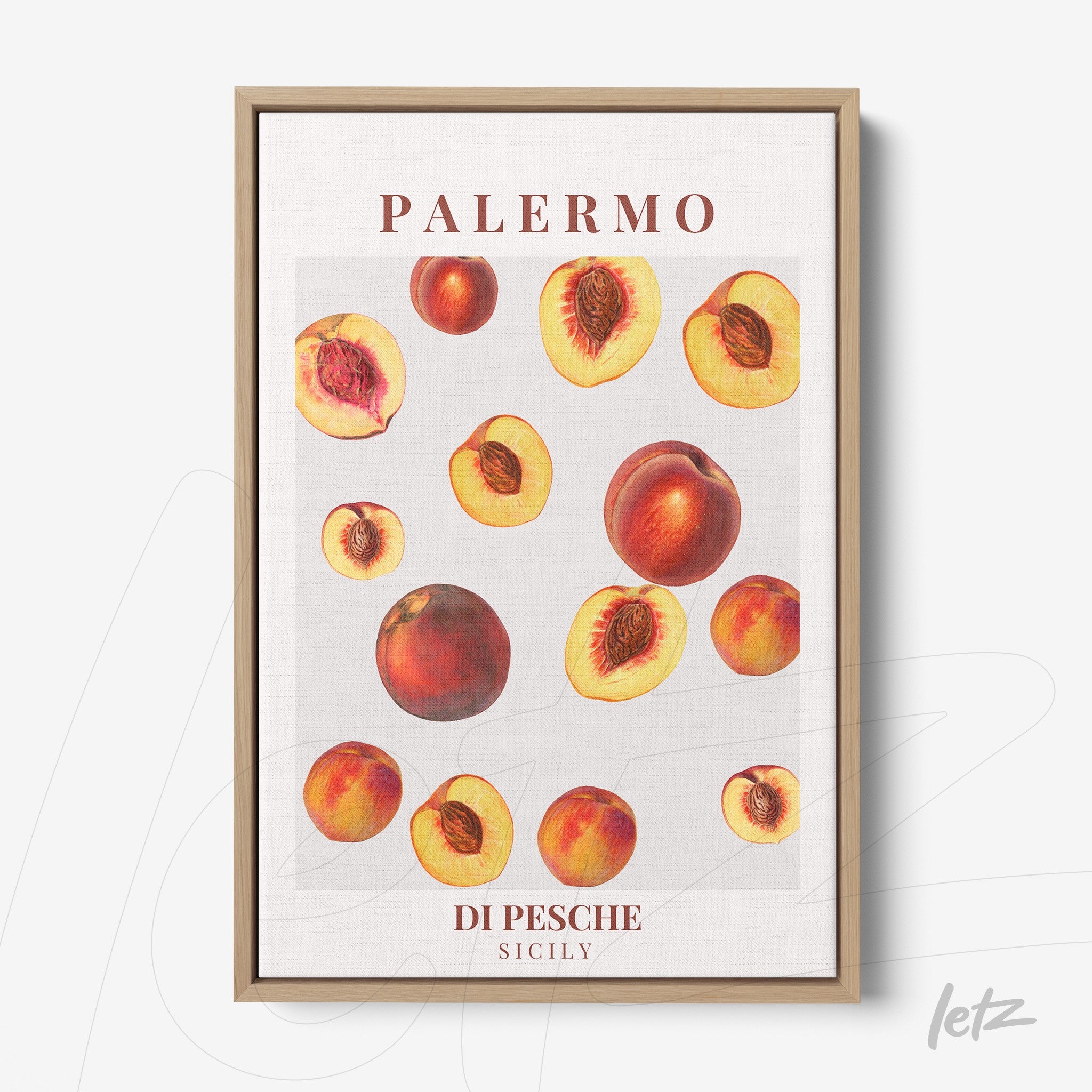 framed wall art featuring ripe peaches on a light background with a light wooden frame