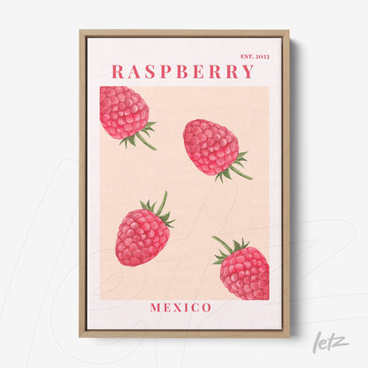 framed artwork featuring raspberries on a light background with a light wood frame
