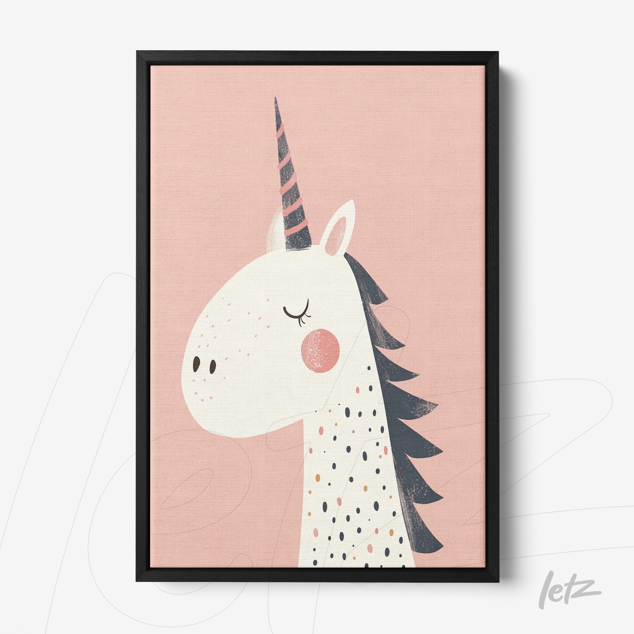 framed wall art featuring a unicorn with a light pink background and black frame