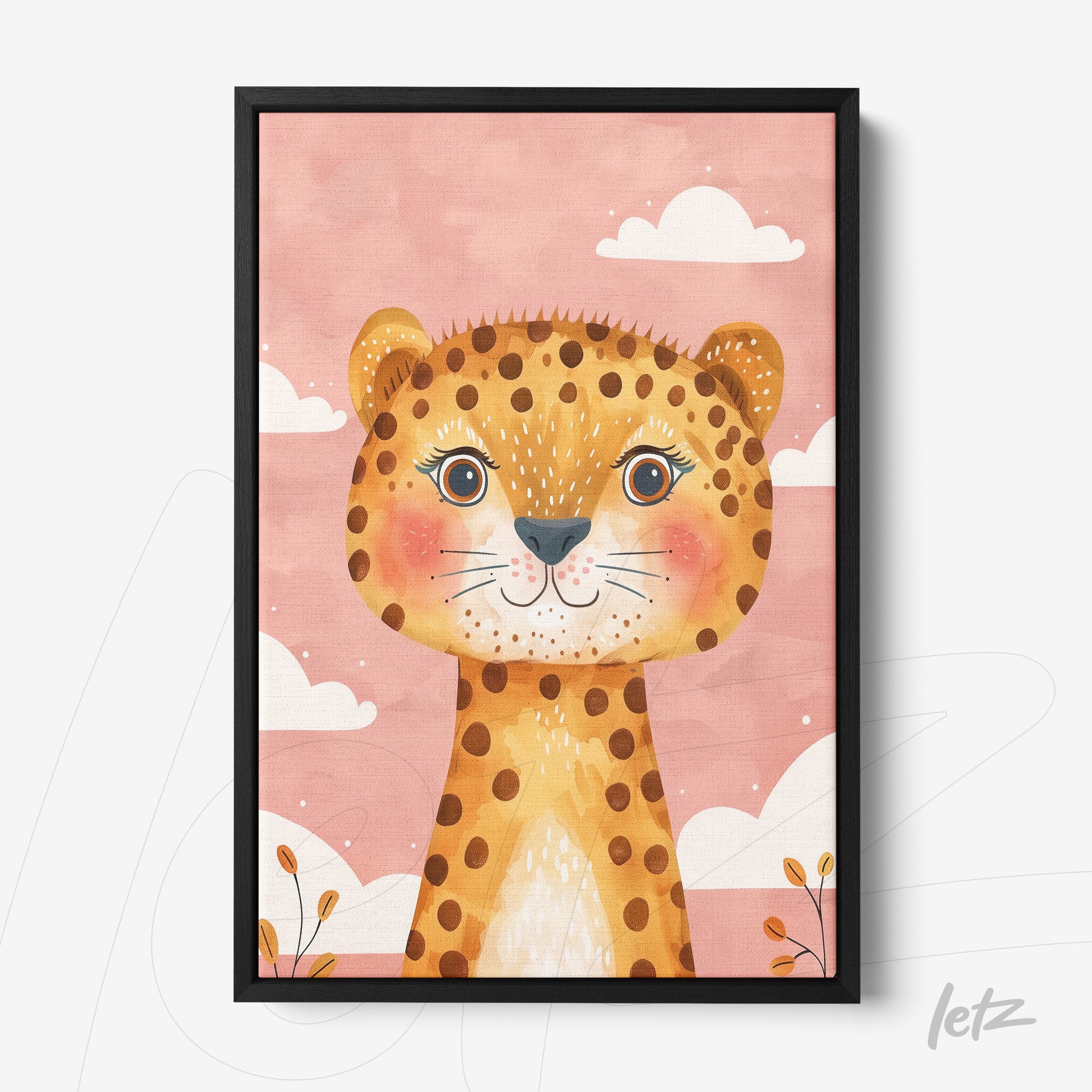 framed wall art featuring a smiling baby leopard against a pink background with white clouds