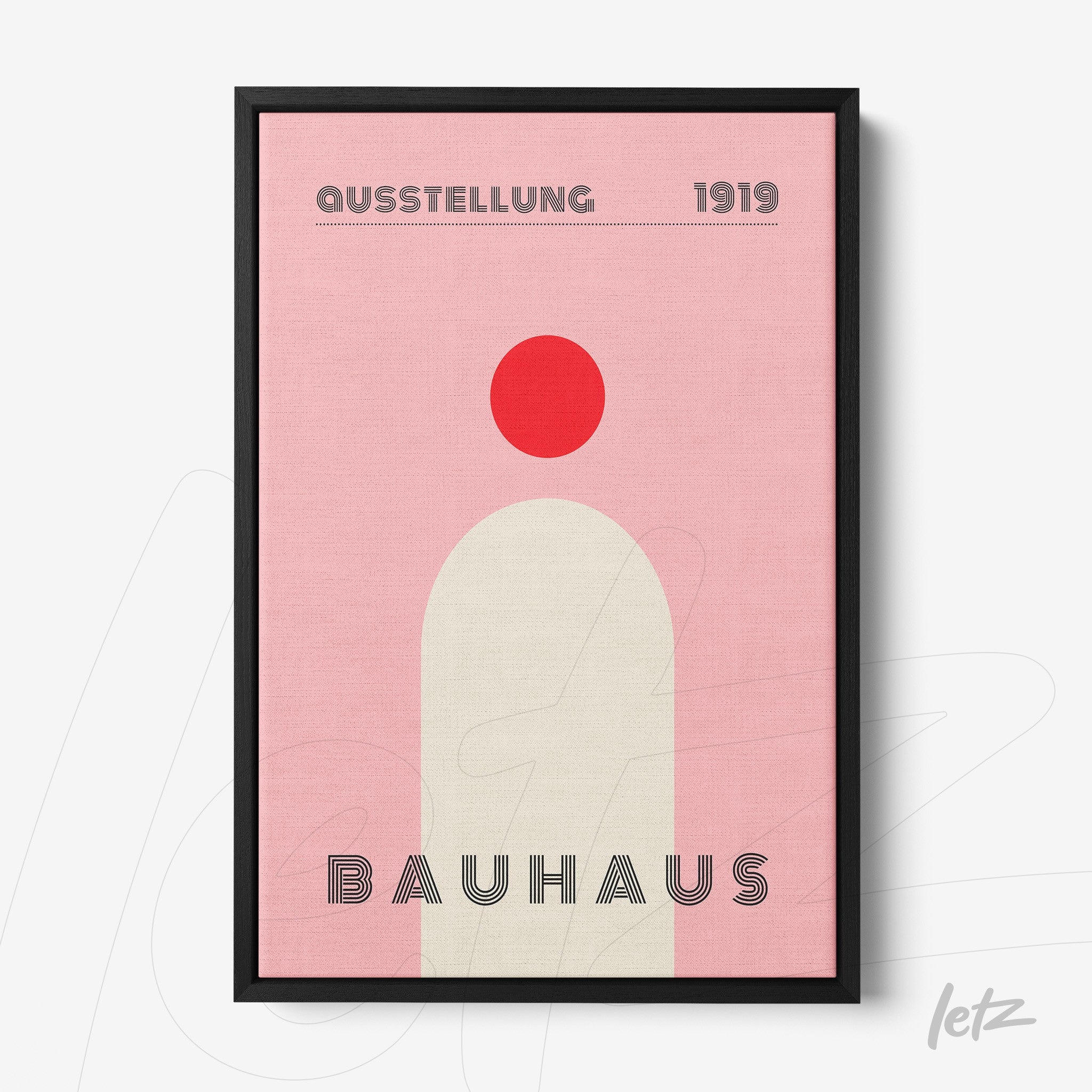poster print of minimalist Bauhaus style art in pink and red hues framed in black