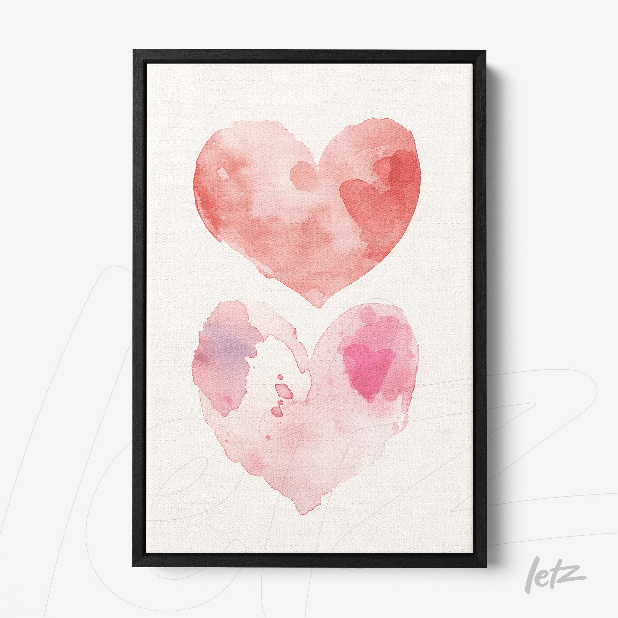 framed watercolor art featuring two hearts in shades of pink and red