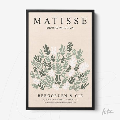framed wall art featuring modern style leaves design with black frame and light background