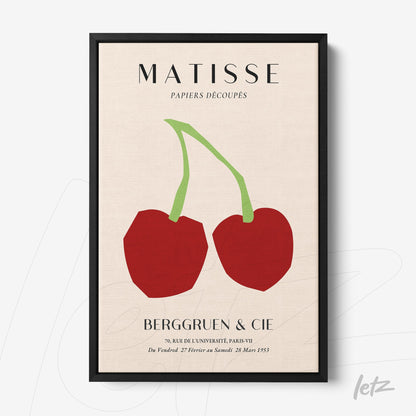 framed modern art depicting stylized cherries on a light background