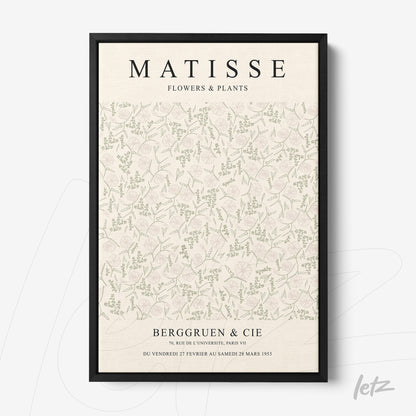 framed wall art featuring soft-toned leaf patterns in a black frame