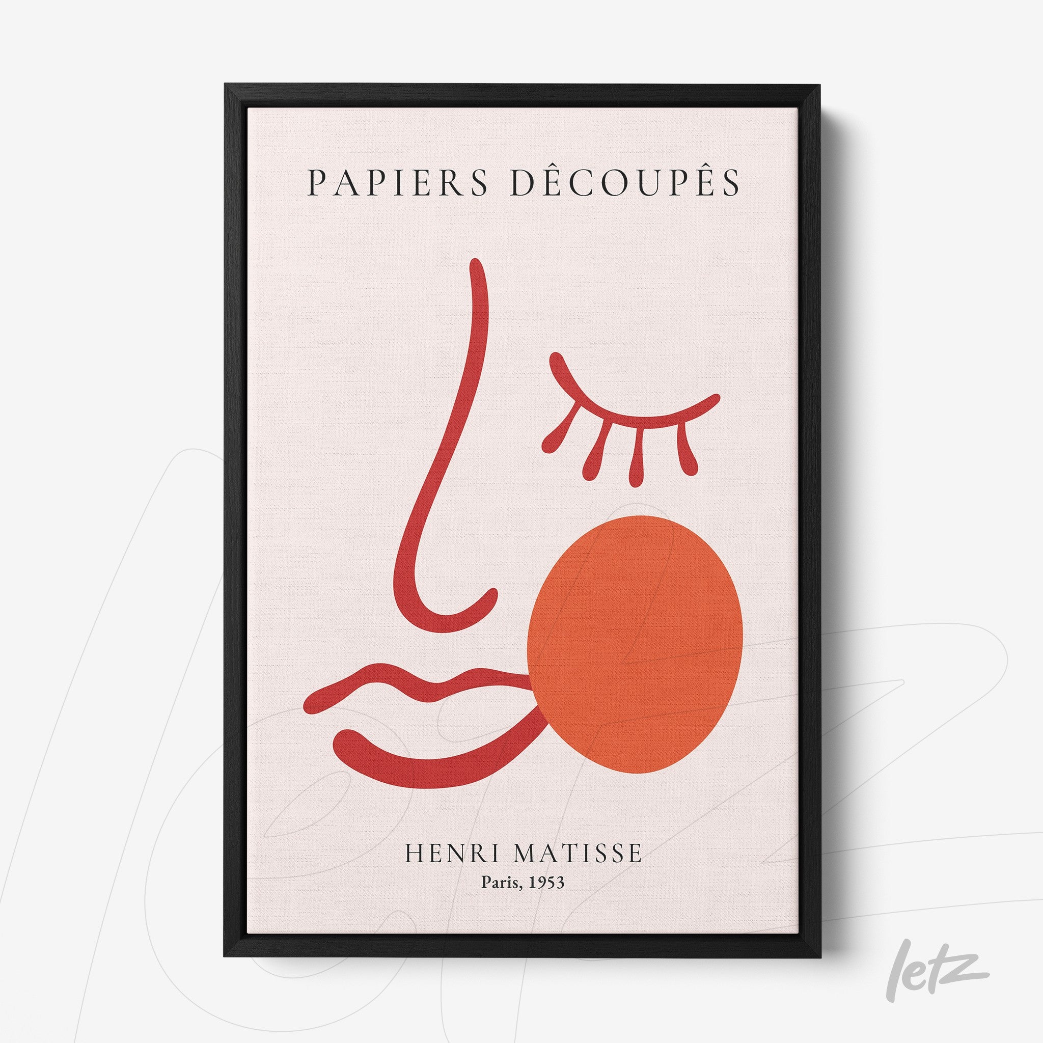 framed abstract art piece featuring a minimalist face in red tones on a light background