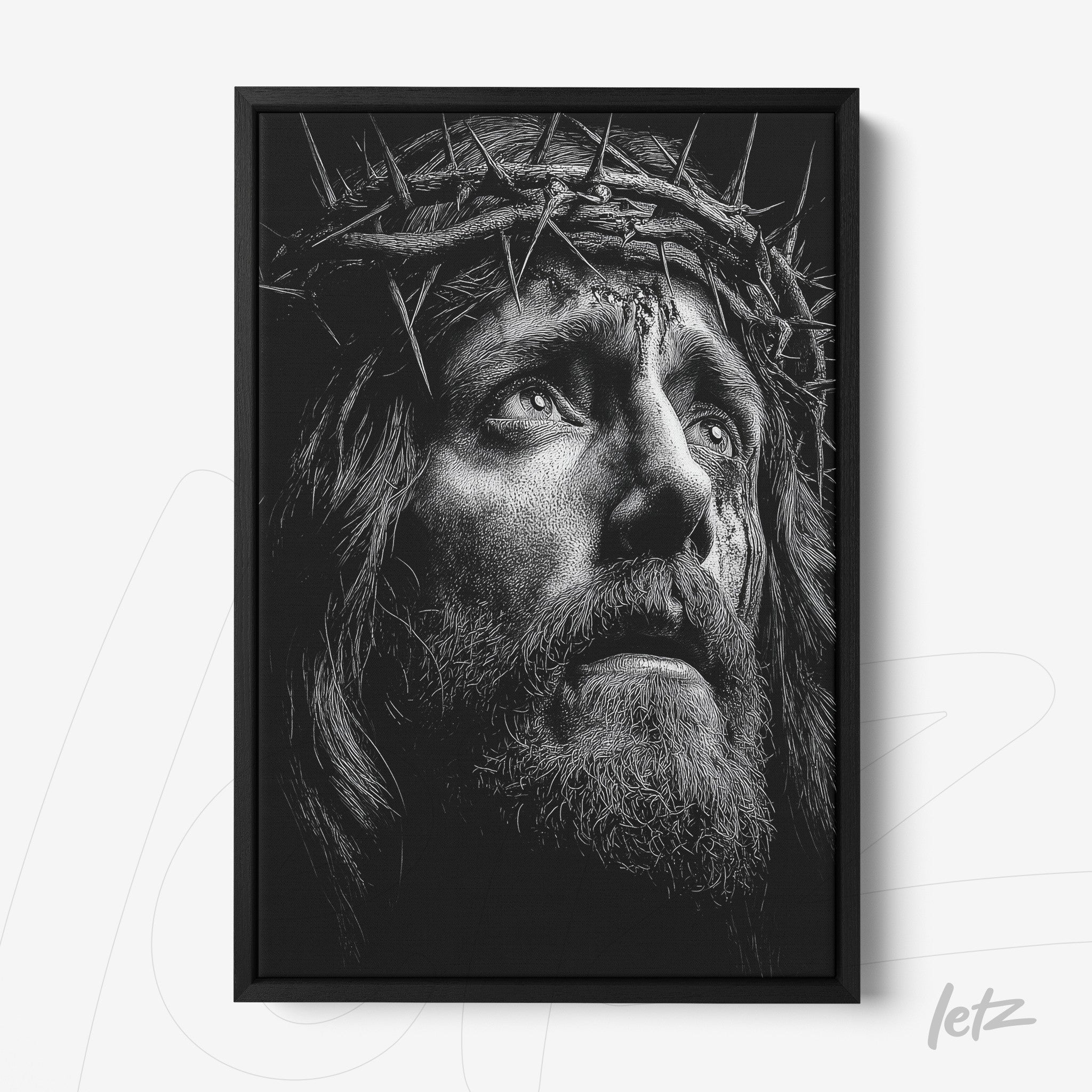 black and white framed art of jesus christ wearing a crown of thorns