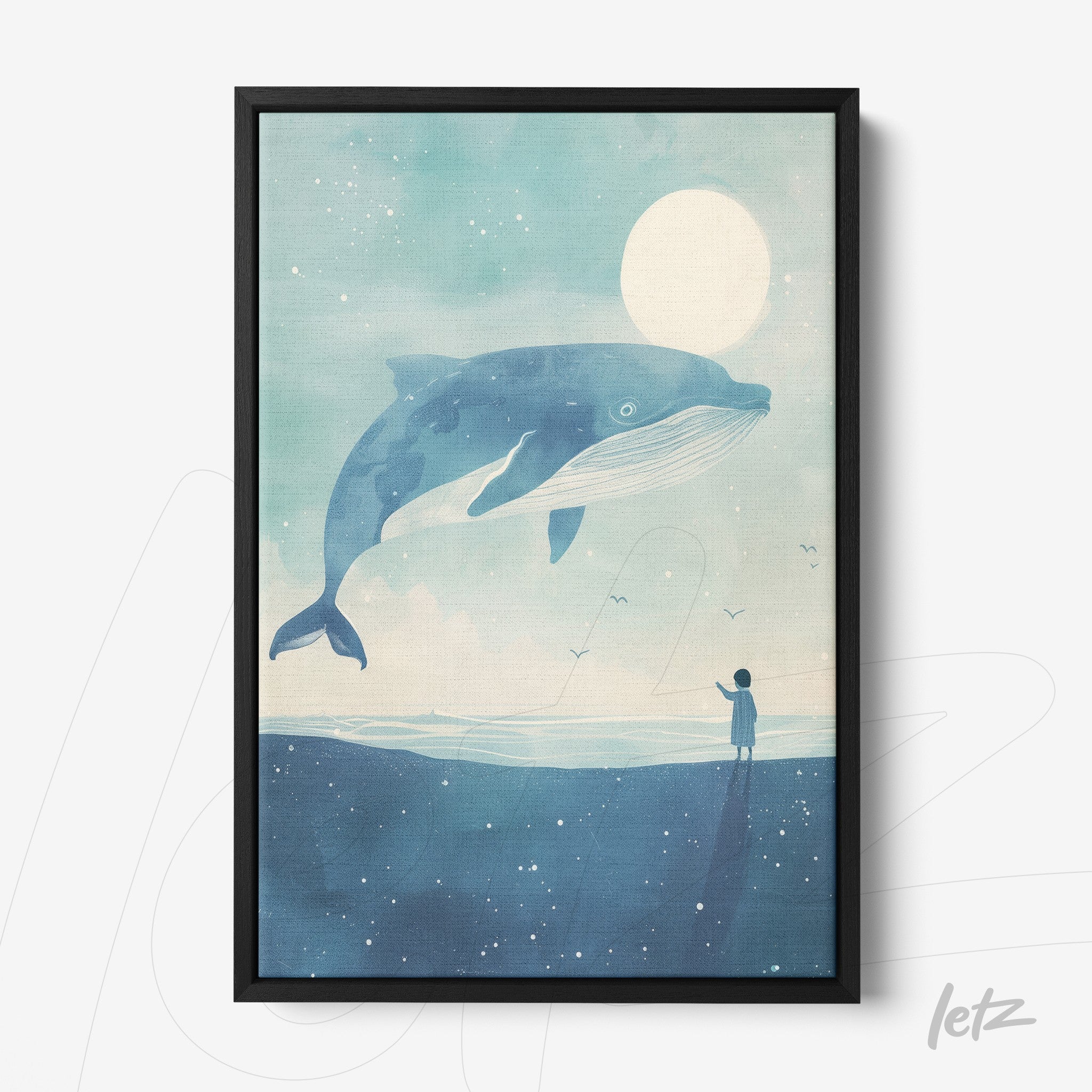 framed wall art featuring a blue whale floating above a serene ocean scene with a small human silhouette and a full moon in a blue background