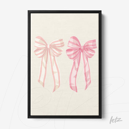 framed artwork featuring pink bows on a light background