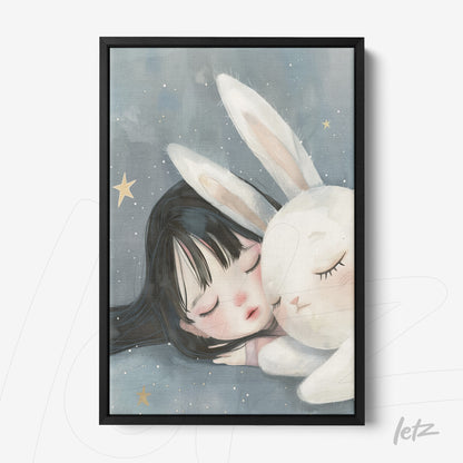 framed artwork of a sleeping girl next to a plush bunny with a black frame