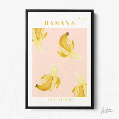 framed art of bananas on a light pink background with black frame