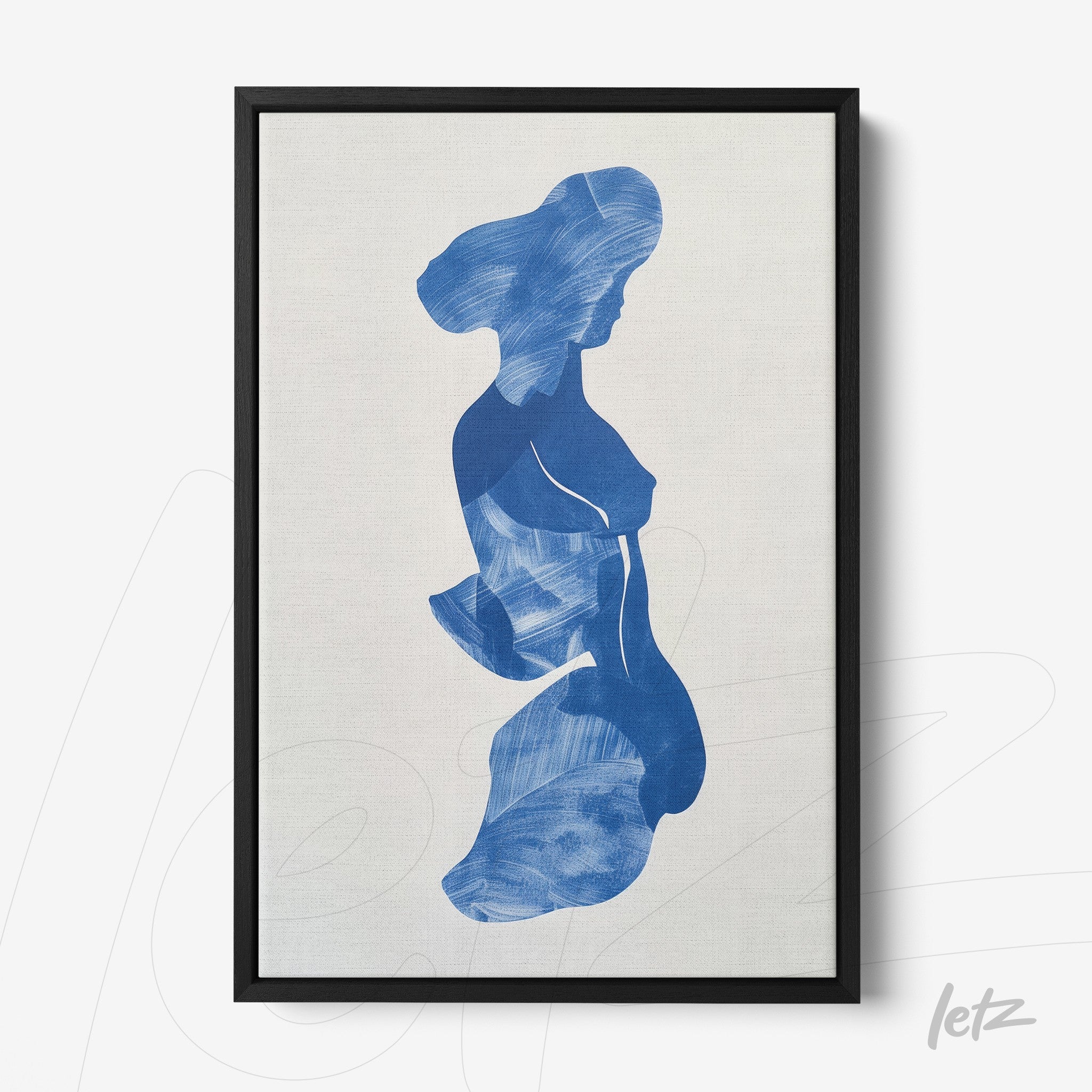 framed artwork in shades of blue depicting the silhouette of a woman with a thin black frame