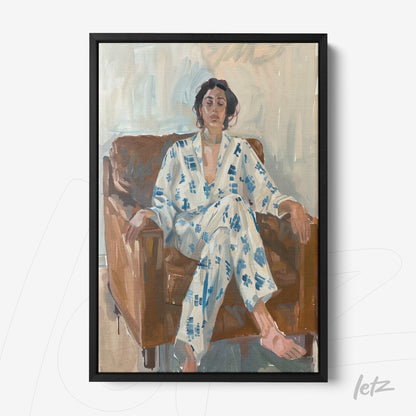 framed artwork depicting a seated woman in a brown chair, wearing a blue patterned white pajama