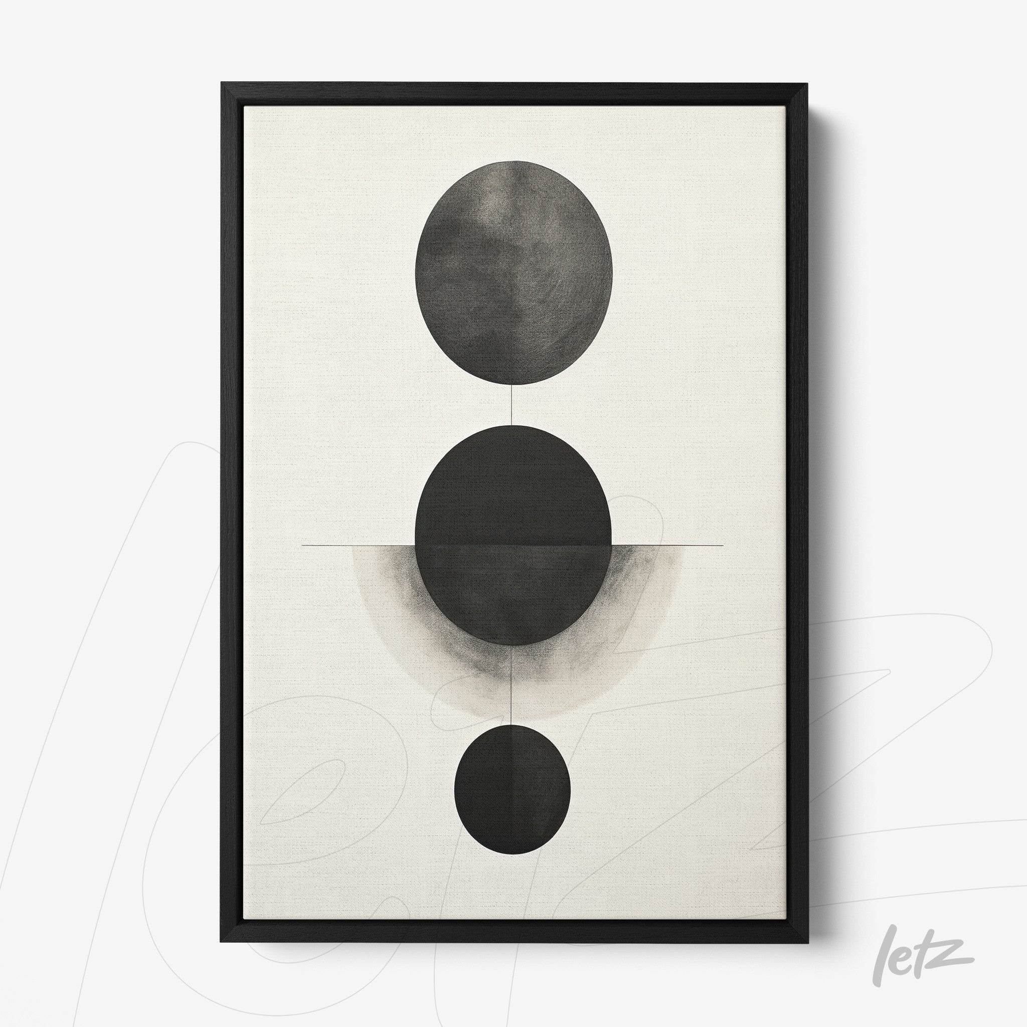 framed art print featuring abstract black and gray circles on a light background