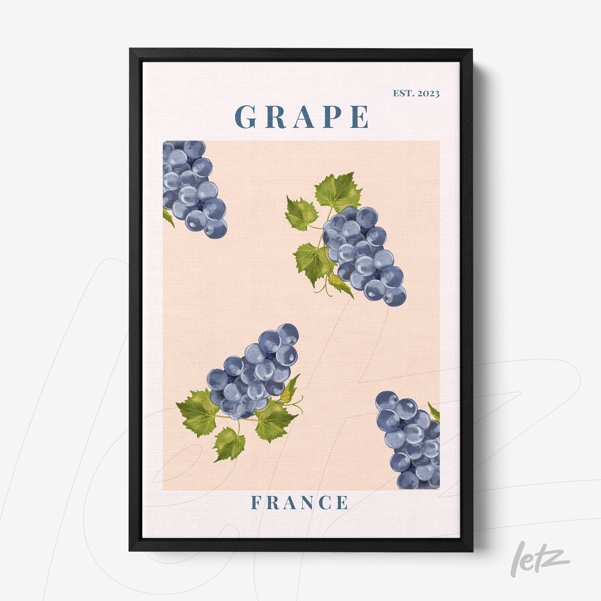 framed wall art featuring blue grape clusters on a pink background with a black frame